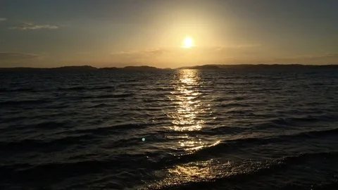 Sunset looking west across Atlantic at Ellös in Bohuslän Archipelago, Sweden Stock Footage 78493003