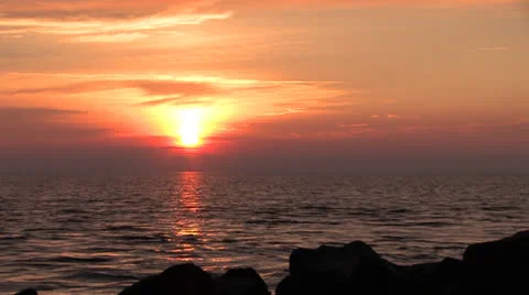 Sunset into looming dark clouds Stock Footage 26097515