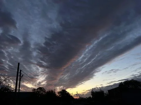 A sunset with a lot of clouds in the sky Stock Photos
