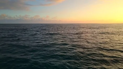 Sunset low flying over the ocean Stock Footage