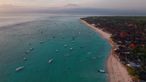 Sunset at low tide at Jungutbatu beach Nusa Lembongan, Bali Indonesia. Volcano Stock Footage 316649768