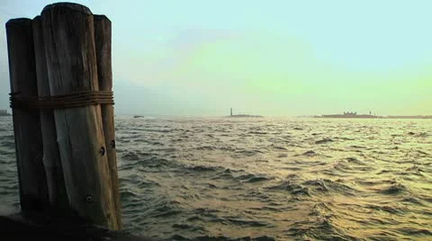 Sunset - Lower Manhattan - Pier with the Statue of Liberty 動画素材 8916865