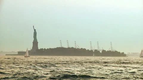 Sunset - Lower Manhattan - Statue of Liberty and Boats 1 動画素材 8916620