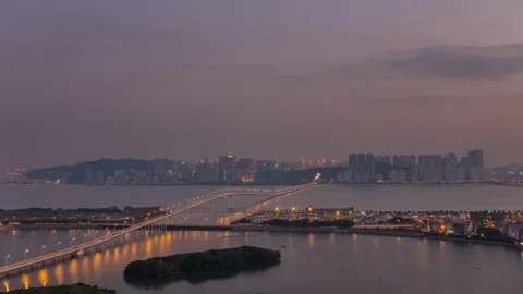 Sunset macau cityscape traffic bridge rooftop panorama 4k time lapse china Stock Footage 89886917