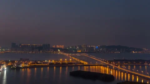 Sunset macau cityscape traffic bridge rooftop panorama 4k timelapse china Stock Footage 162137363