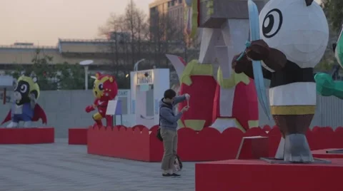 Sunset - man taking smartphone pic - 2015 Taiwan lantern festival Stock Footage 46973490