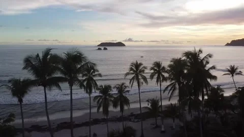 SUNSET IN MANUEL ANTONIO BEACH DRONE 4K Stock Footage 158582582
