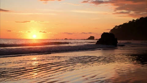 Sunset at Manuel Antonio beach Stock Footage 235556763