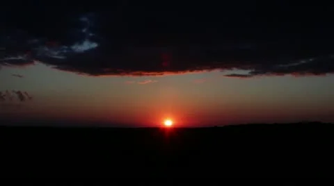 Sunset with many clouds time lapse Stock Footage 11358052