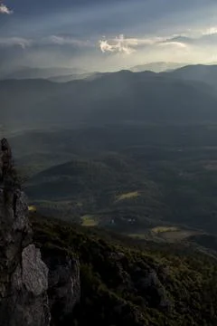 Sunset in Mare De Deu Del Mont peak, La Garrotxa, Spain Photos