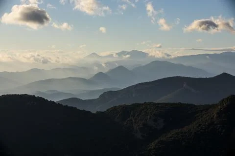 Sunset in Mare De Deu Del Mont peak, La Garrotxa, Spain Photos