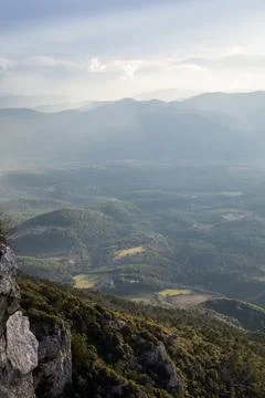 Sunset in Mare De Deu Del Mont peak, La Garrotxa, Spain 写真素材