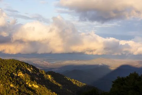 Sunset in Mare De Deu Del Mont peak, La Garrotxa, Spain Photos