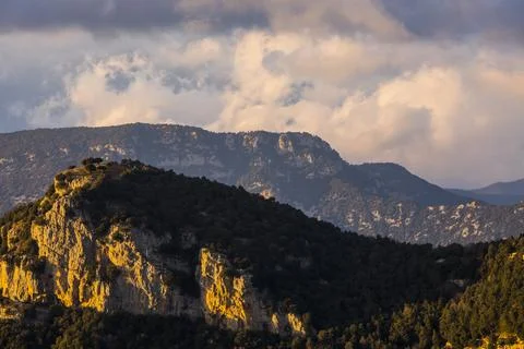 Sunset in Mare De Deu Del Mont peak, La Garrotxa, Spain Фото