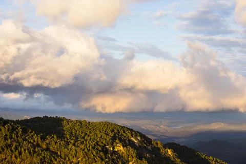 Sunset in Mare De Deu Del Mont peak, La Garrotxa, Spain Photos