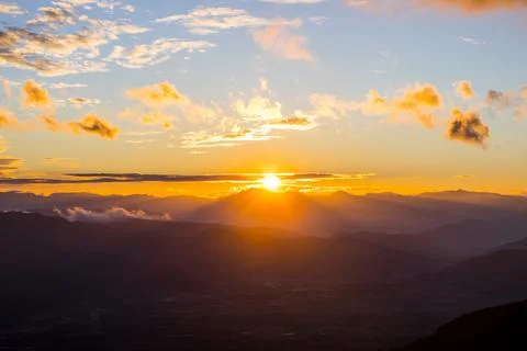 Sunset in Mare De Deu Del Mont peak, La Garrotxa, Spain Photos