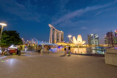Sunset marina bay hotel artscience light up Stock Footage 158417100