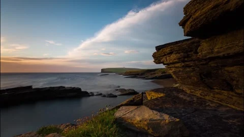 Sunset at the Marwick Shore in Orkney  HD Time Lapse Video stock 256084146