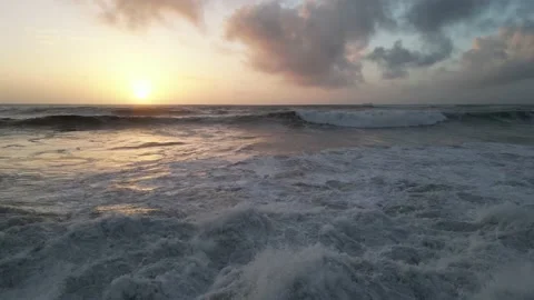 Sunset with massive waves Stock Footage 229414639