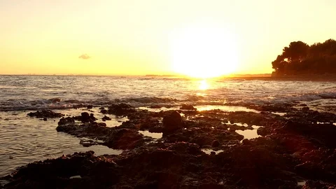Sunset by the Mediterranean sea in Oropesa Stock-Footage 101426088