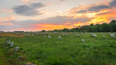 Sunset in the megalithic alignment of Carnac Stock Photos