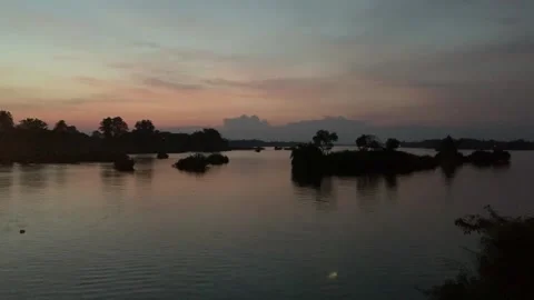 Sunset on the Mekong river in Don Det island Vídeos de archivo 343157788