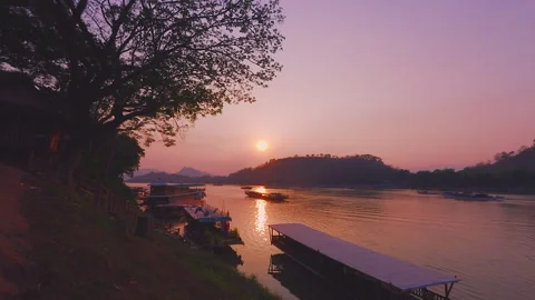 Sunset on the Mekong River in Luang Prabang Laos UNESCO World Heritage Site Stock Footage 343763409