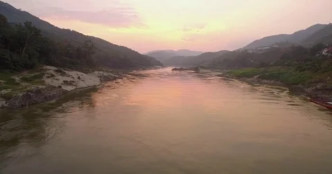 Sunset On The Mekong River At Pak Beng, Laos, Push Through Shot With Camera Tilt Stock Footage 80105791