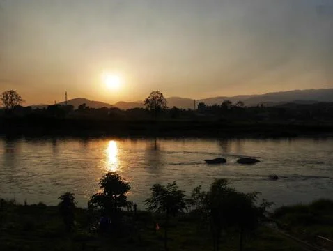 Sunset at Mekong river Stock Photos