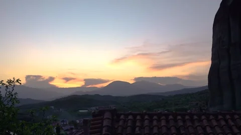 Sunset in Meteora, Greece Large Mountain Rocks Kastraki Kalambaka Small Tow.. Stock Footage 334871031