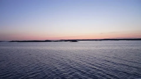 Sunset midsummer evening night over Swedish islands and archipelago in Bohuslän Stock Footage 163920445