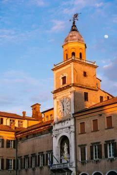 Sunset in Modena, Emilia Romagna, Italy. Communal Palace and moon Foto stock