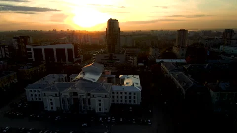 Sunset in a modern city.The sun is reflected in the skyscraper. Stock Footage 131299712