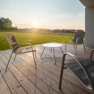 Sunset on modern patio Stock Photos