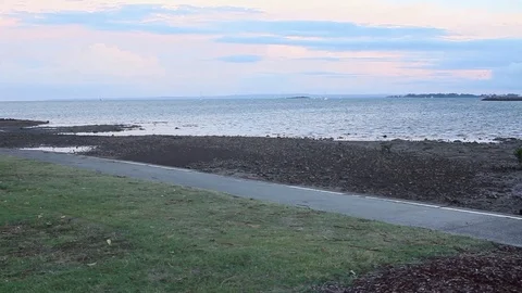 Sunset moment at the beach with blue and pink sky Stock Footage 124299964