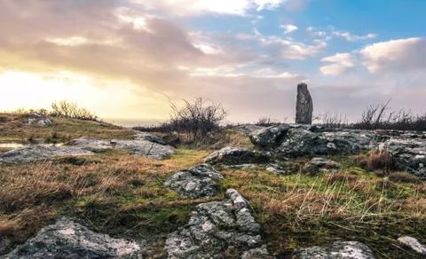 Sunset on monolith Stock Photos