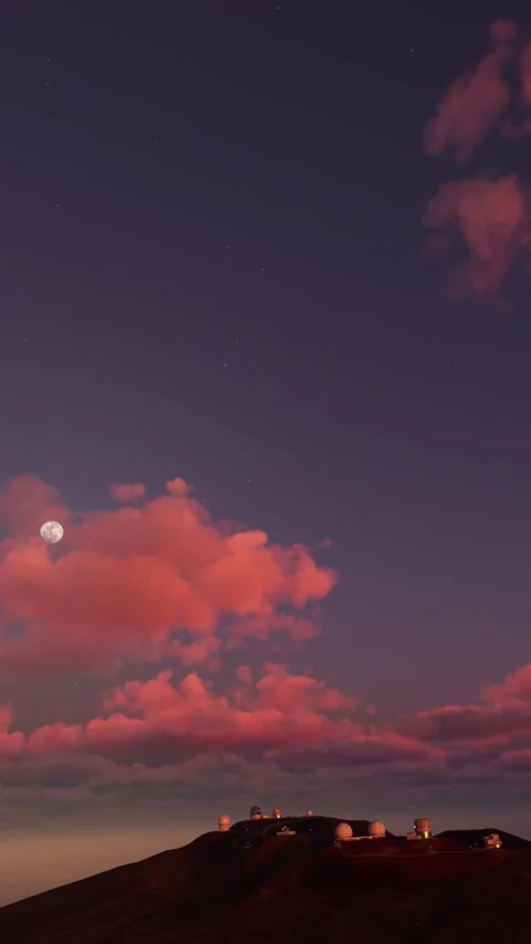 Sunset with the Moon in the background of the Mauna Kea observatory in Hawaii Stock Footage 283142171