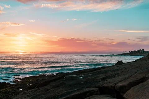 Sunset in Morocco, surf spots anchor point in the background. Stock Photos
