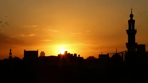 Sunset at the mosques of an Arab city Stock Footage 122223350