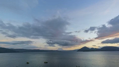 Sunset up motion timelapse of the famous Lake Toya with Mount Yotei Stock Footage