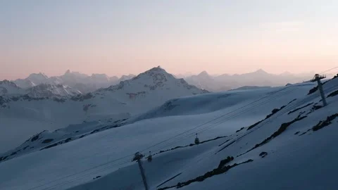 Sunset on Mount Elbrus, view of the mountains and the cable car Video stock 336313272