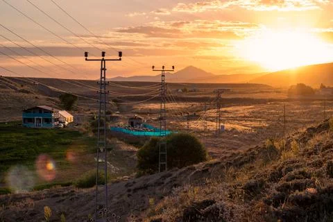 A sunset with a mountain in the background.For wallpaper copy text space Stock Photos