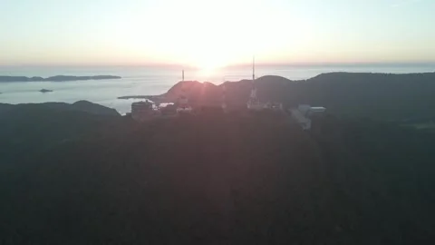 A sunset on a mountain Stock Footage 293952046