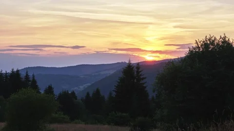 Sunset in the mountain forest landscape in summer, pastel color of the sky Stock-Footage 246969963