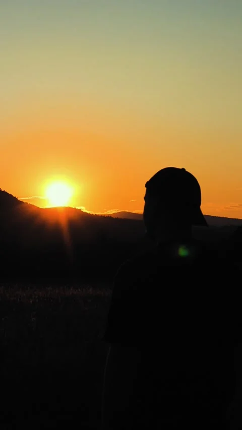 Sunset on the mountain with human silhouette Stock Footage 279063133