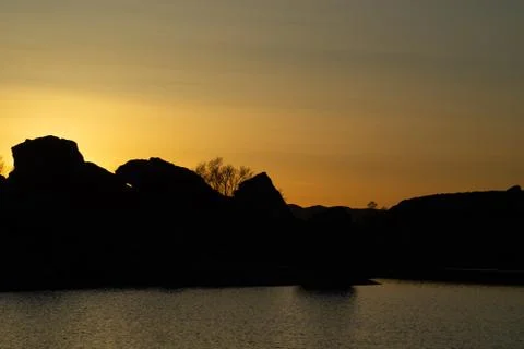 Sunset from mountain lake Stock Photos