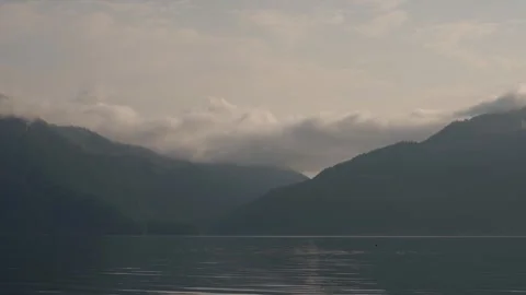Sunset mountain lake soft smoke haze light forest bc vancouver harrison hot Stockbeeldmateriaal 277669167