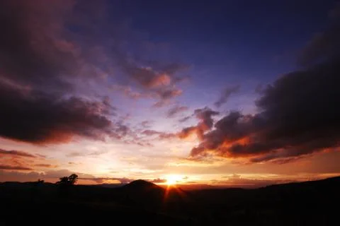 Sunset in the mountain Stock Photos