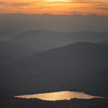 Sunset in the mountain Stock Photos
