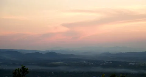 Sunset mountain range beautiful landscape mist, dusk golden time dramatic sky. B Видео 147165338